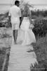 Heiraten in Florida romantisch Paar auf Steg geht in den Sonnenuntergang