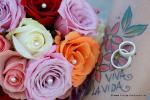 Tattoo mit Hochzeitsringen und Rosenbouquet