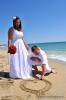 Heiraten in Florida am Strand wird ein Herz gemalt
